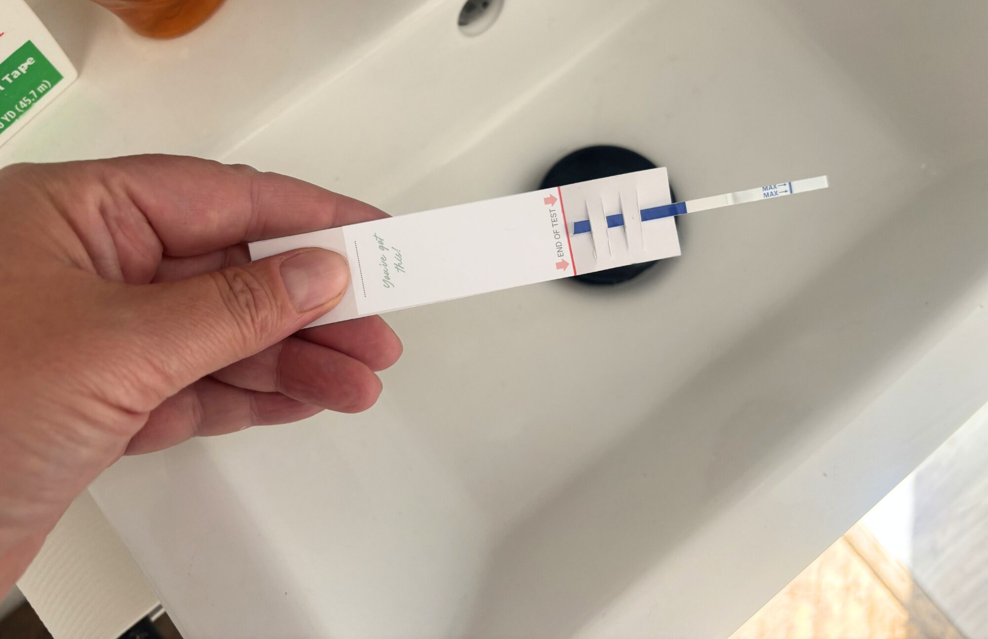 Hoopsy Hold handle over the sink