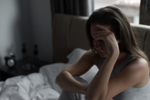 sad woman after infertility struggles and then a miscarriage